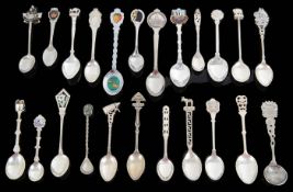 A comprehensive collection of mostly silver souvenir teaspoons