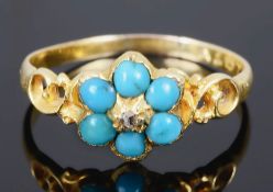 A delicate early Victorian diamond and turquoise forget me not cluster ring