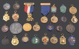 An interesting large collection of early 20th century mostly gold and silver sporting medals