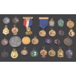 An interesting large collection of early 20th century mostly gold and silver sporting medals