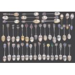 A collection of early 20th century silver souvenir teaspoons