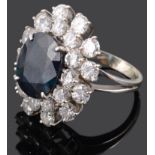 A large Continental sapphire and diamond set cluster ring