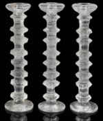 Three contemporary Finnish Iittala Festivo candlesticks designed by Timo Sarpaneva