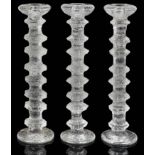 Three contemporary Finnish Iittala Festivo candlesticks designed by Timo Sarpaneva