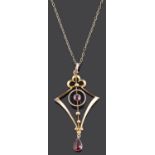 A delicate Edwardian garnet set drop pendant