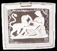 A mid 19th century Staffordshire pottery pearlware relief wall plaque, "Antiocles and the lion"