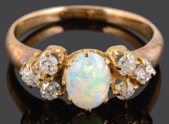 An attractive Edwardian opal and diamond ring