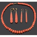 Two pairs of Victorian carved coral ear drops and a coral necklace