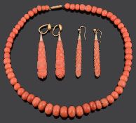 Two pairs of Victorian carved coral ear drops and a coral necklace