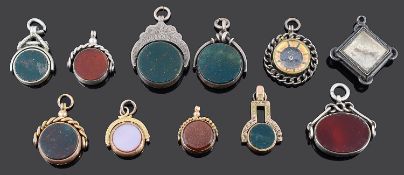 A collection of Victorian and Edwardian swivel and other pendant fob seals