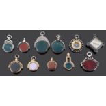 A collection of Victorian and Edwardian swivel and other pendant fob seals