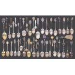 A collection of mostly early 20th century silver commemorative and other spoons