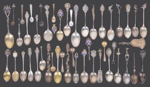 A collection of mostly early 20th century silver commemorative and other spoons