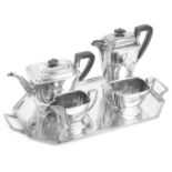 A four piece Art Deco silver tea service; a twin handled silver tray