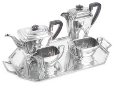 A four piece Art Deco silver tea service; a twin handled silver tray
