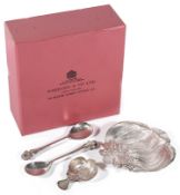 A Garrard & Co silver Prince of Wales feather dish, caddy spoon and two spoons