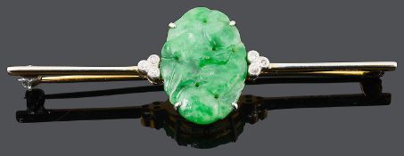 An Art Deco carved green jade and diamond set bar brooch