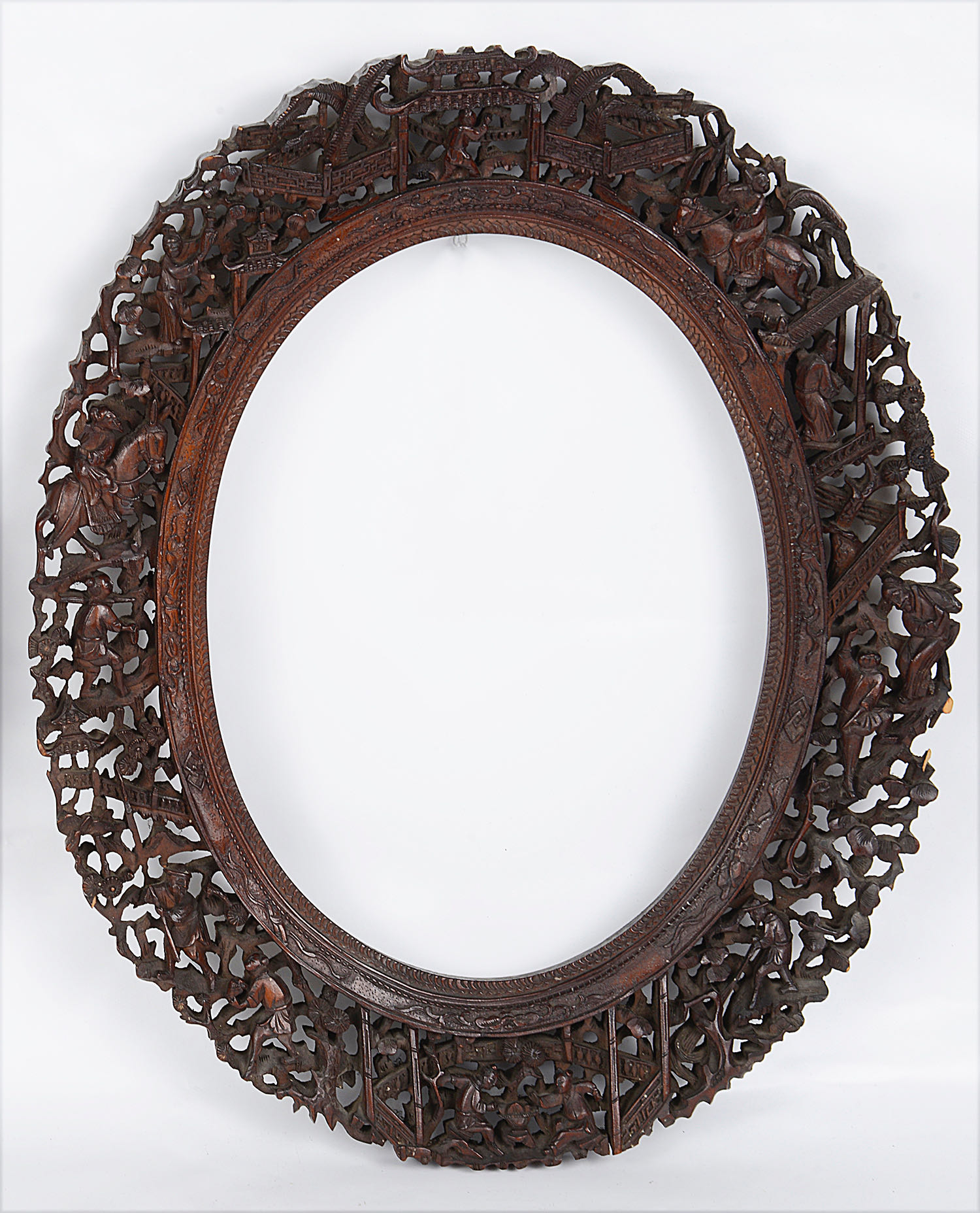 A pair of late 19th century Chinese Canton carved wood oval frames (2) - Image 2 of 2