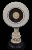A late 19th century Indian ivory circular photograph frame