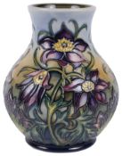 A modern Moorcroft Pottery 'Pasque Flower' trial vase designed by Philip Gibson