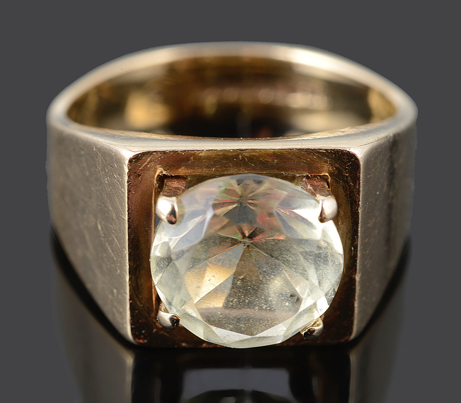 A mid twentieth Century gold and citrine set dress ring