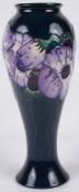 A modern Moorcroft Pottery Collectors Club Poppies' vase designed by Emma Rafferty