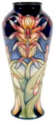 A modern Moorcroft Pottery 'Lizard Orchid' vase designed by Philip Gibson