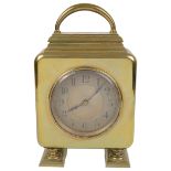 An Edwardian brass desk clock