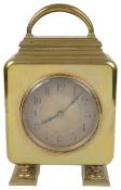 An Edwardian brass desk clock