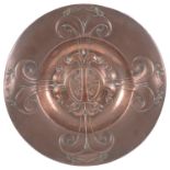An Arts and Crafts copper alms dish