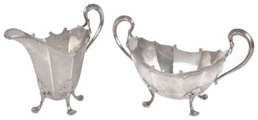 A George V Scot. silver milk jug and matching twin handled sugar basin (2)