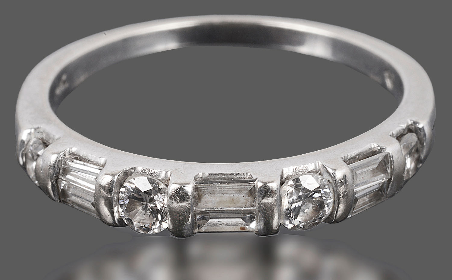 A Continental diamond set half eternity ring