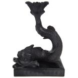 A 20th century Wedgwood black basalt dolphin candlestick