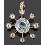 An early 20th Century aquamarine and gem set starburst pendant brooch