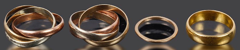 Two three colour gold Russian wedding rings and two others