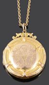 An early 20th Century circular picture locket on chain