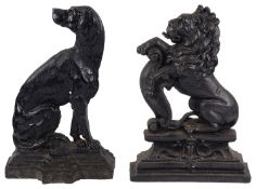 Two early Victorian cast iron door stops (2)