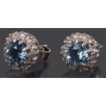 A pair of delicate contemporary Continental blue zircon and diamond set ear studs