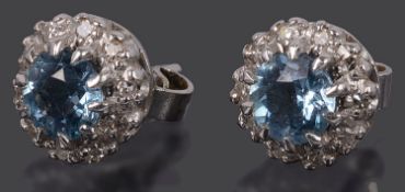 A pair of delicate contemporary Continental blue zircon and diamond set ear studs