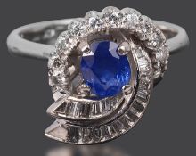 A Continental sapphire and diamond set fancy ring