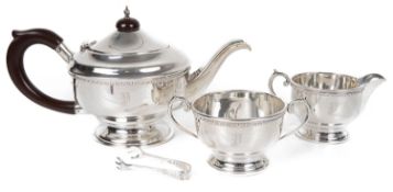 A George V silver three piece bachelors tea service (4)