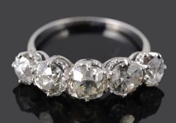 A large five stone old cut diamond set ring