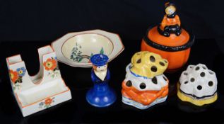 A Clarice Cliff Bizarre United Services figural pepper; others (6)