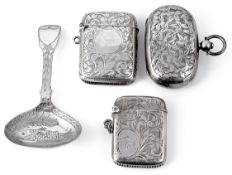 A George III bright cut engraved fiddle pattern silver caddy spoon; others (4)