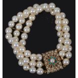 A Continental three row cultured pearl bracelet