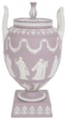 A Wedgwood lilac jasper ware twin handled vase and cover