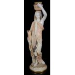 A large Royal Worcester blush ivory figure of a water carrier, circa 1906