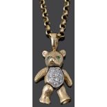 An articulated 9ct gold bear pendant on chain