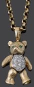 An articulated 9ct gold bear pendant on chain