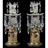 A pair of George III ormolu mounted lustre candlesticks (2)